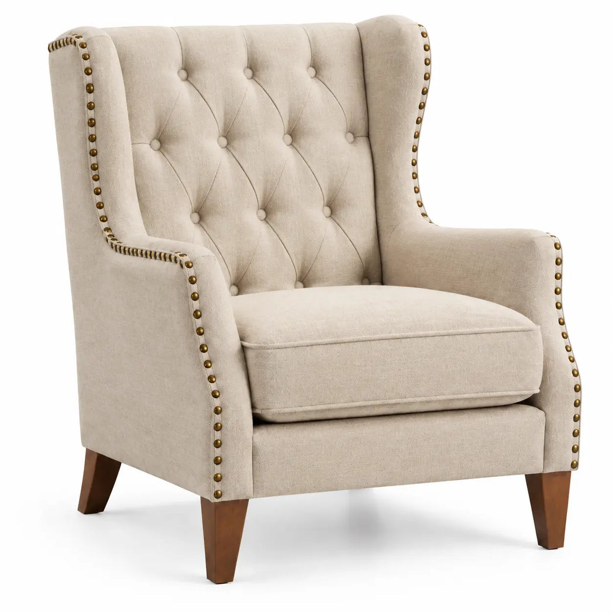 Fauteuil beige à haut dossier capitonné et bordures cloutées