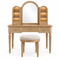 Coiffeuse beige à miroir arqué, tiroirs tressés et tabouret rond